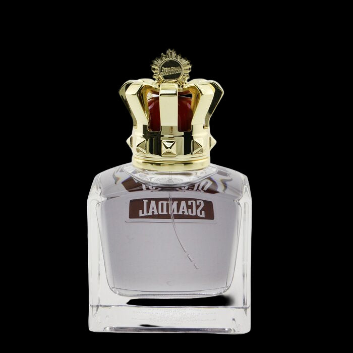 Scandal perfume bottle with gold cap on a white background