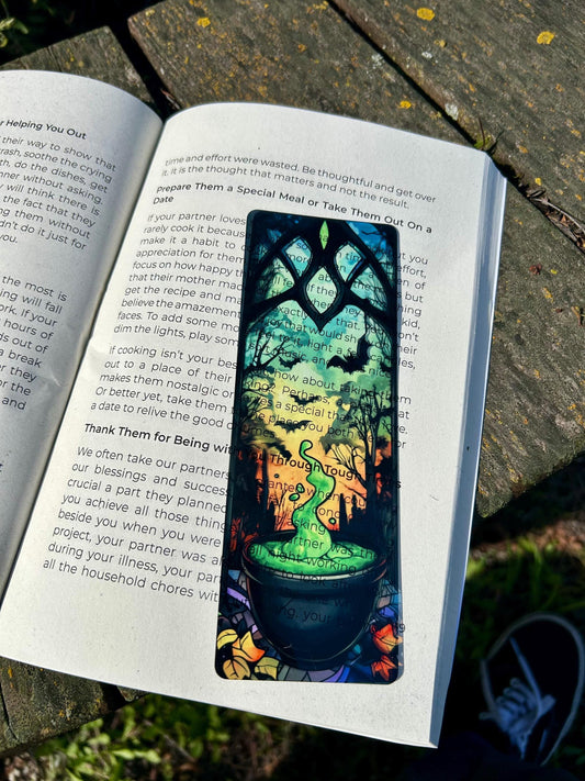Colorful bookmark with a dragon design on an open book