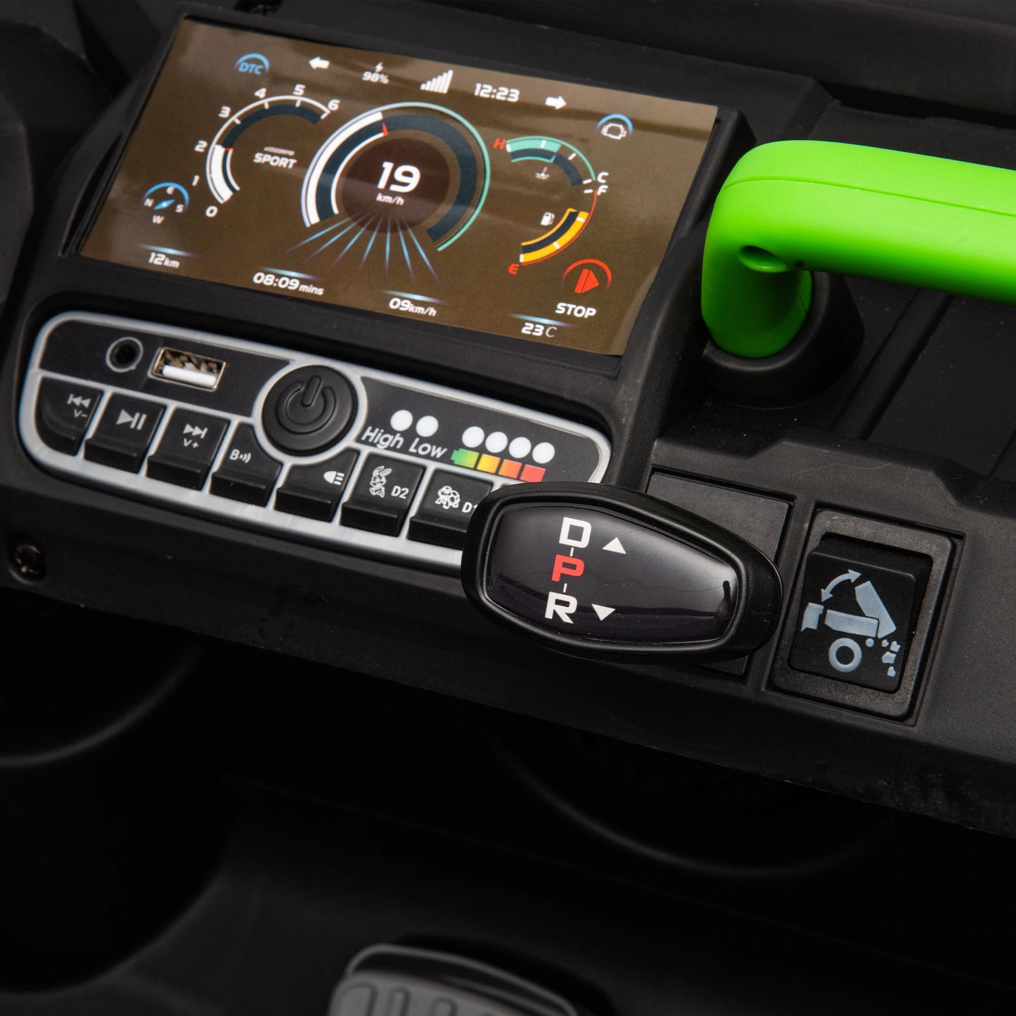 Control panel with digital display and buttons on a vehicle, featuring a green handle.
