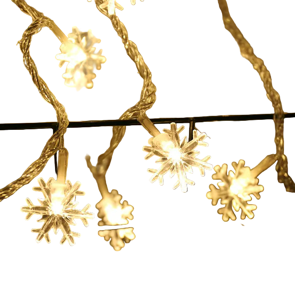 String of snowflake-shaped lights on a blurred background