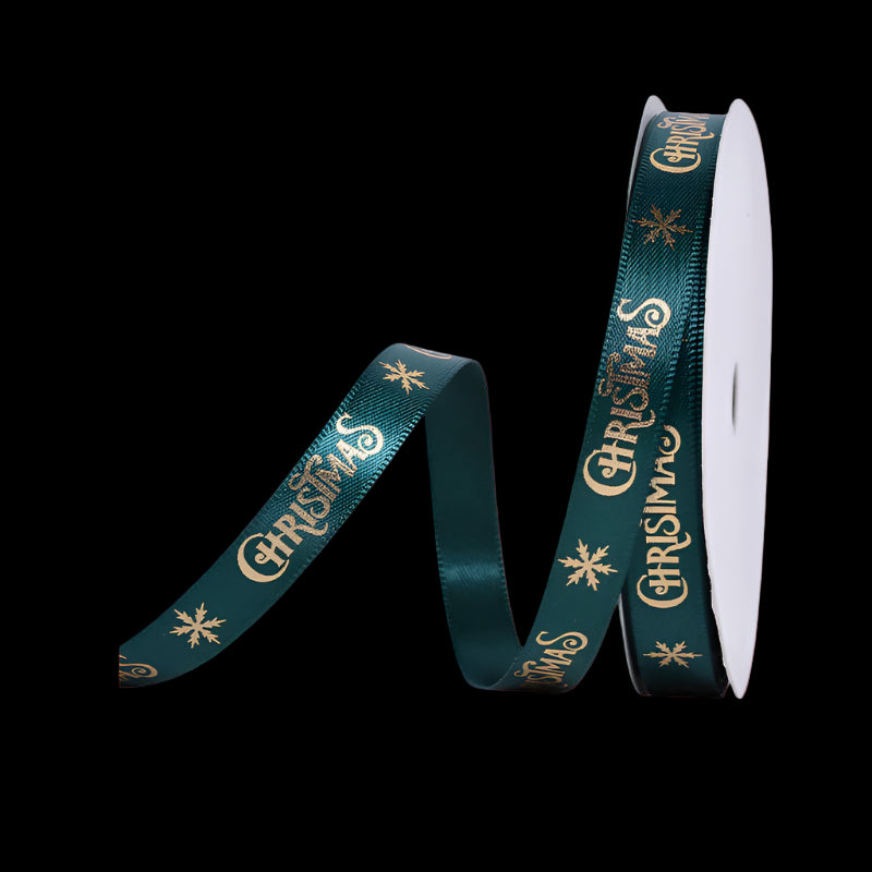 Green Christmas ribbon with gold text on a white background