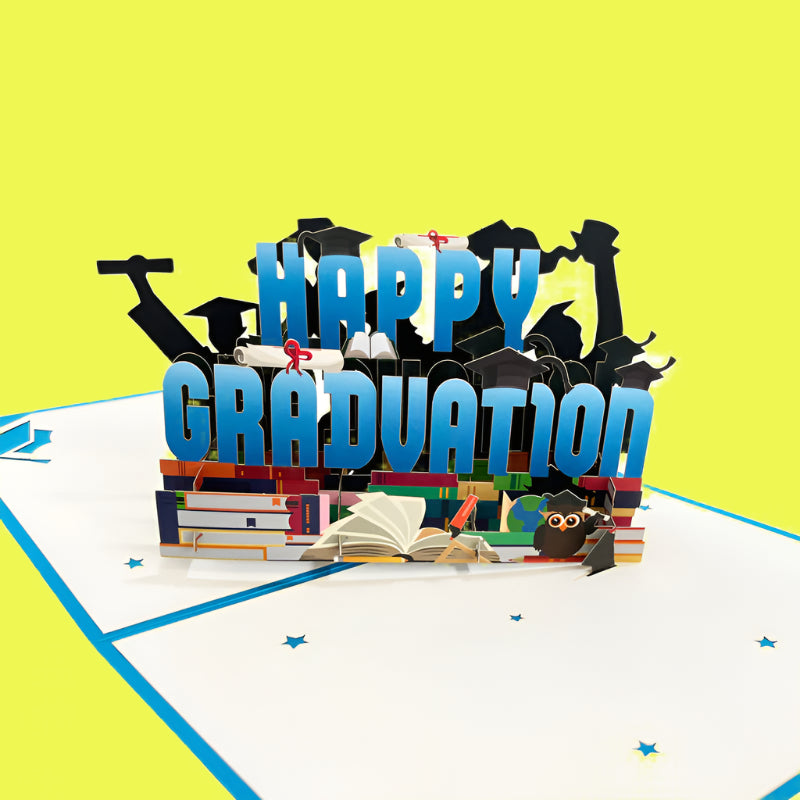 3D pop-up card with 'Happy Graduation' text and graduation-themed elements on a white background.