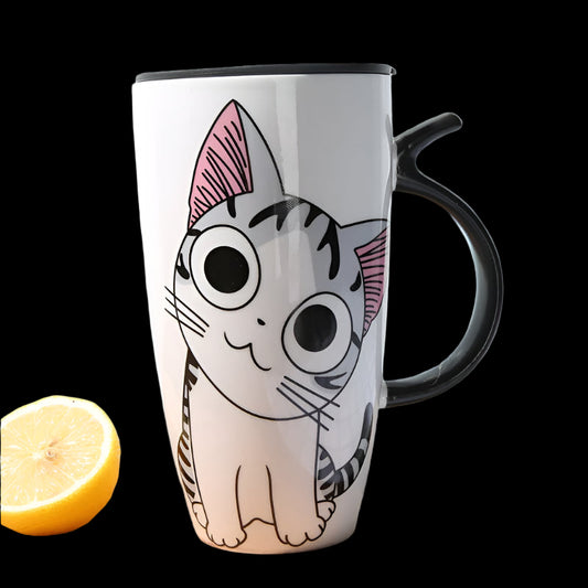 Mug with a cat design on a wooden surface with a lemon