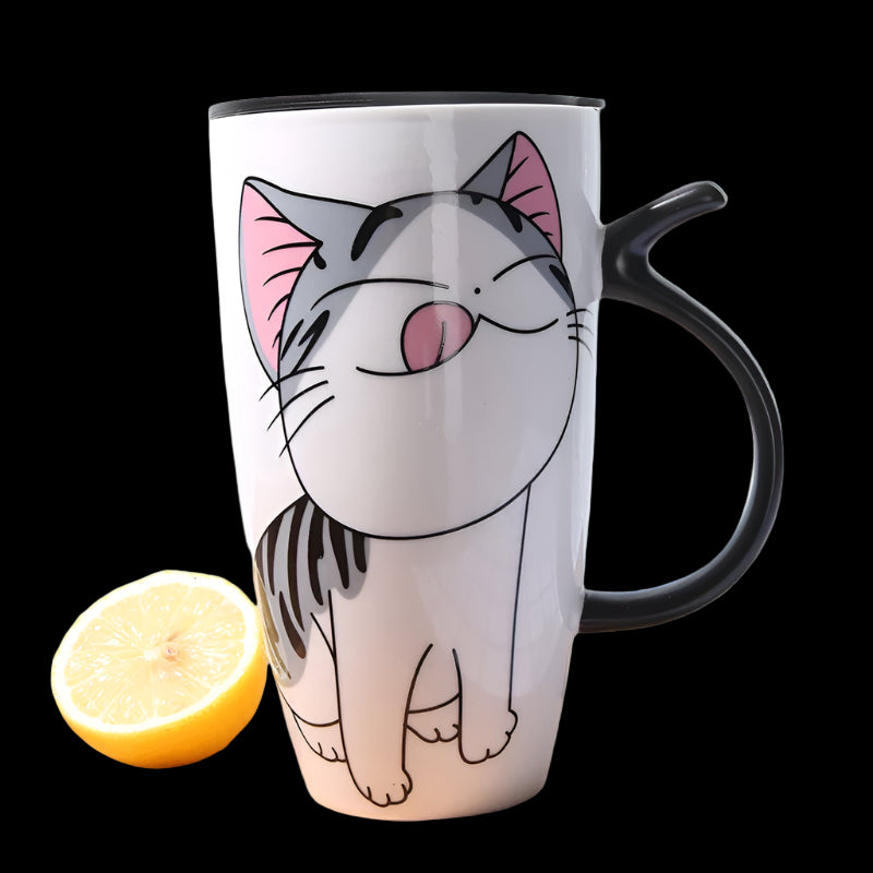 Cat-shaped mug with a lemon on a wooden surface