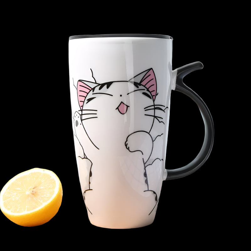 White mug with a cat design on a wooden surface with a lemon