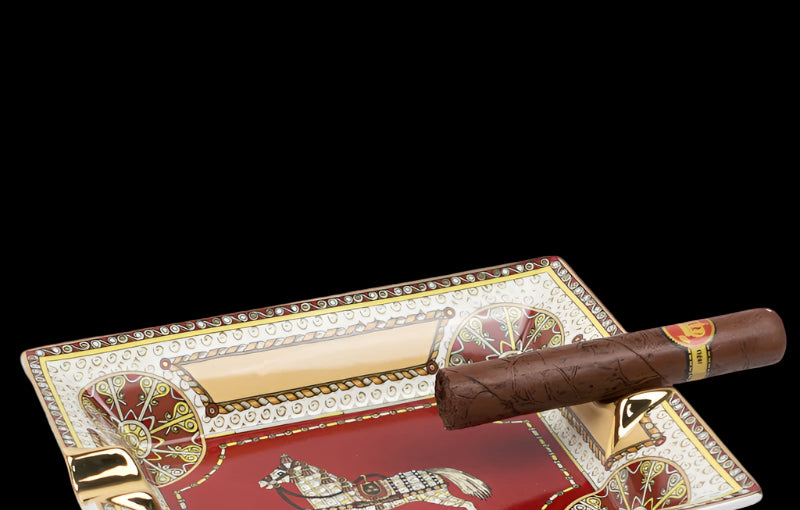 Decorative cigar ashtray with a horse design on a white background