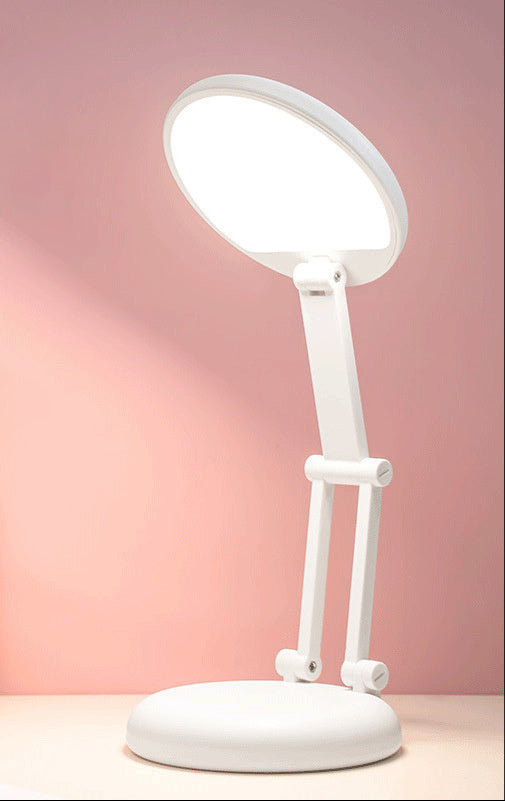 White desk lamp on a pink background