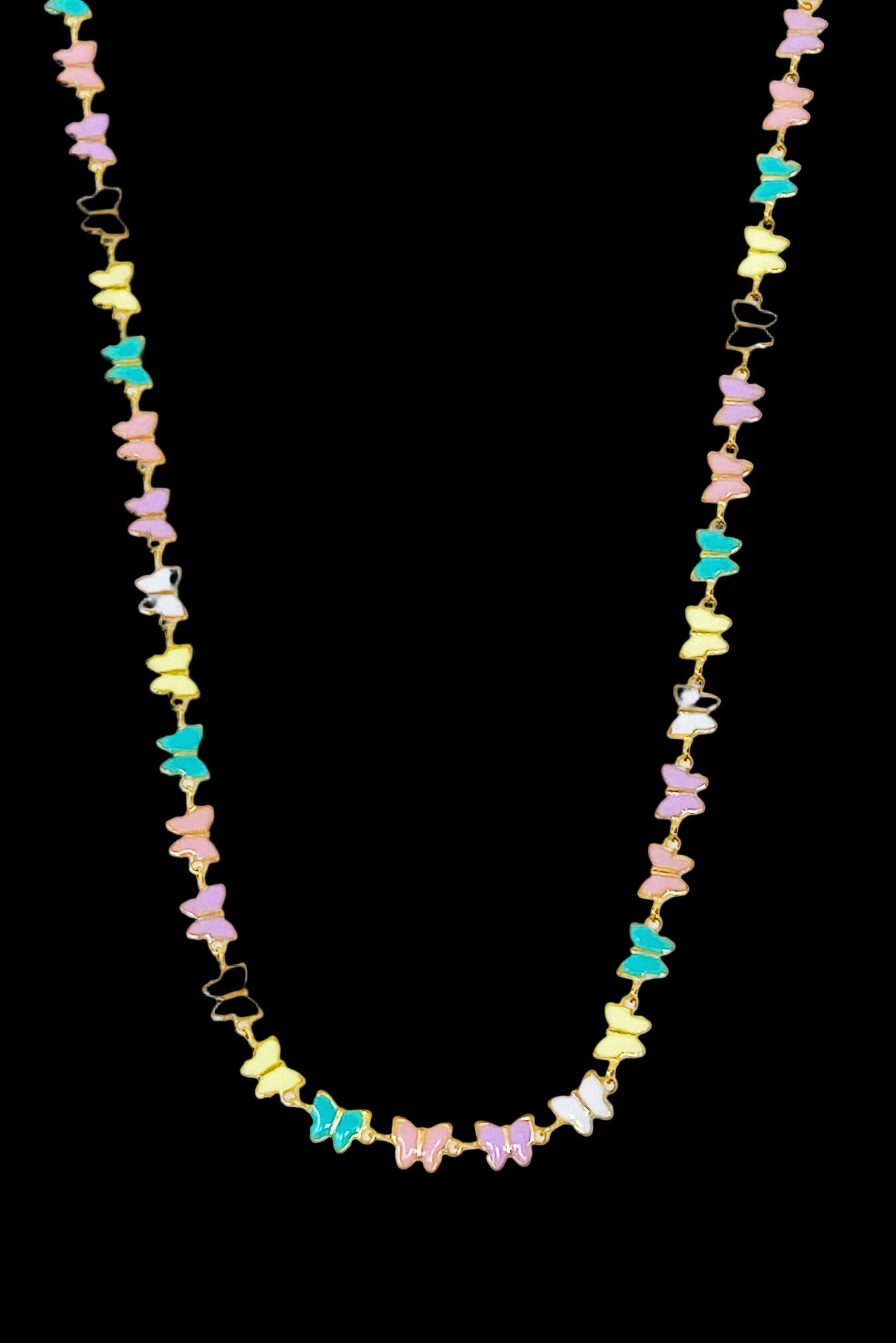 Necklace with colorful butterfly-shaped beads on a light gray background