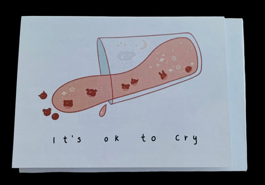 Card with a bandaid illustration and 'It's ok to cry' text on a white background