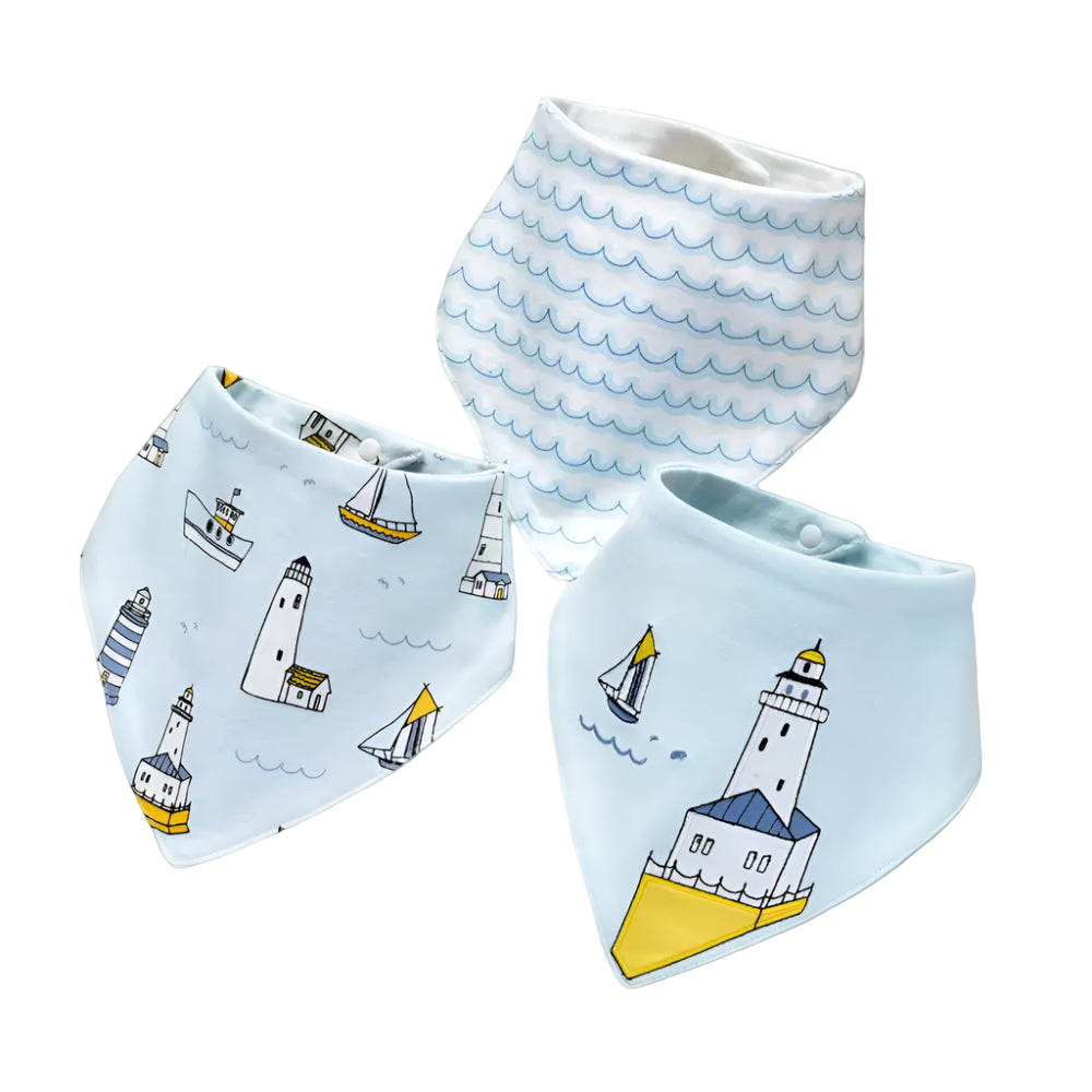 Three baby bibs with nautical patterns on a white background