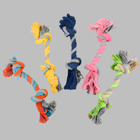 Colorful dog rope toys on a white background