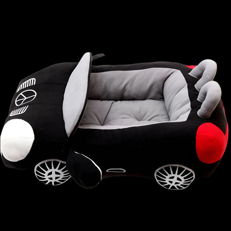 Black car-shaped pet bed with gray interior on a white background