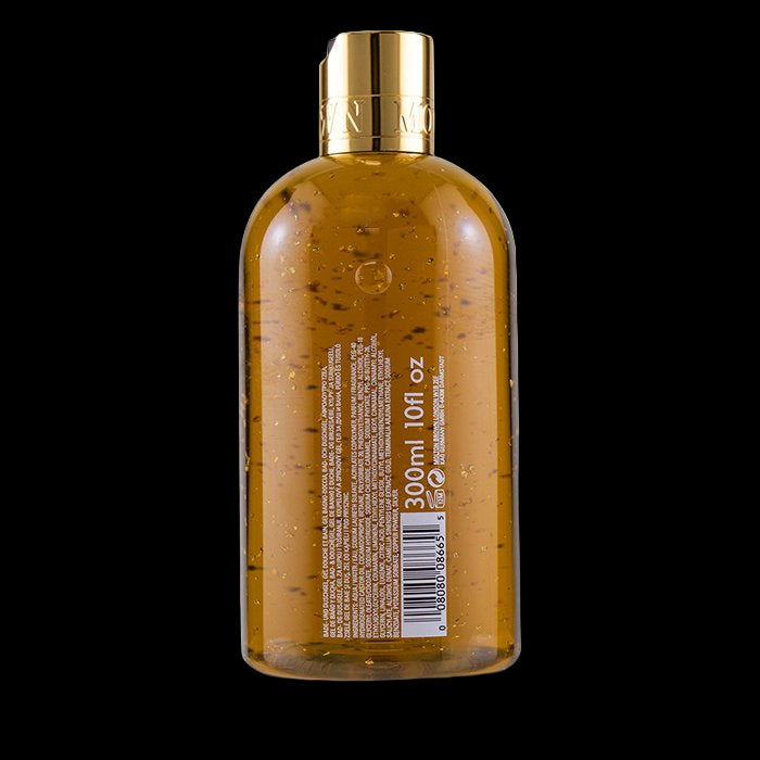 Brown bottle with gold cap on a white background