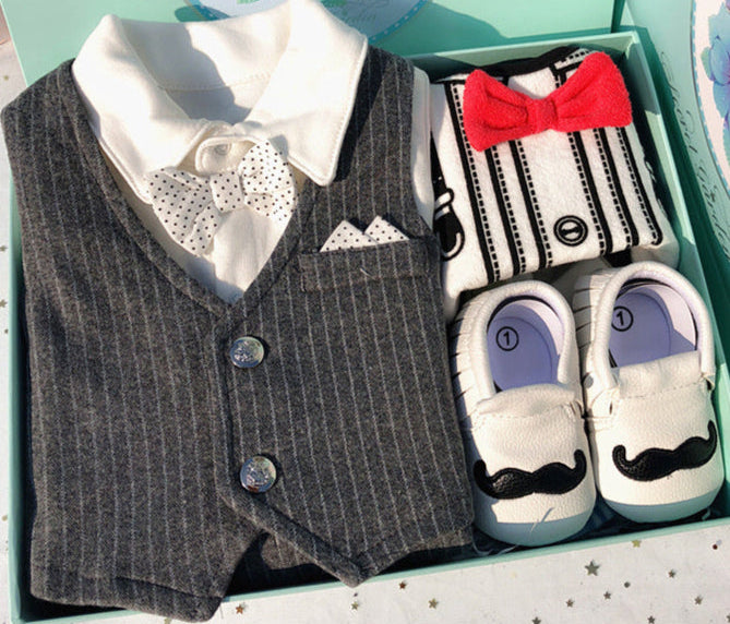 Baby boy outfit set with vest, shoes, and socks in a box