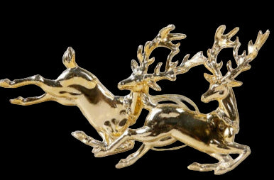 Gold deer figurine on a clear stand with a white background