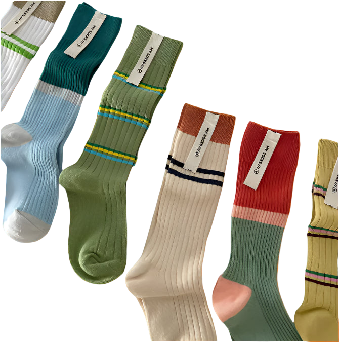Set of colorful socks with striped patterns on a light gray background