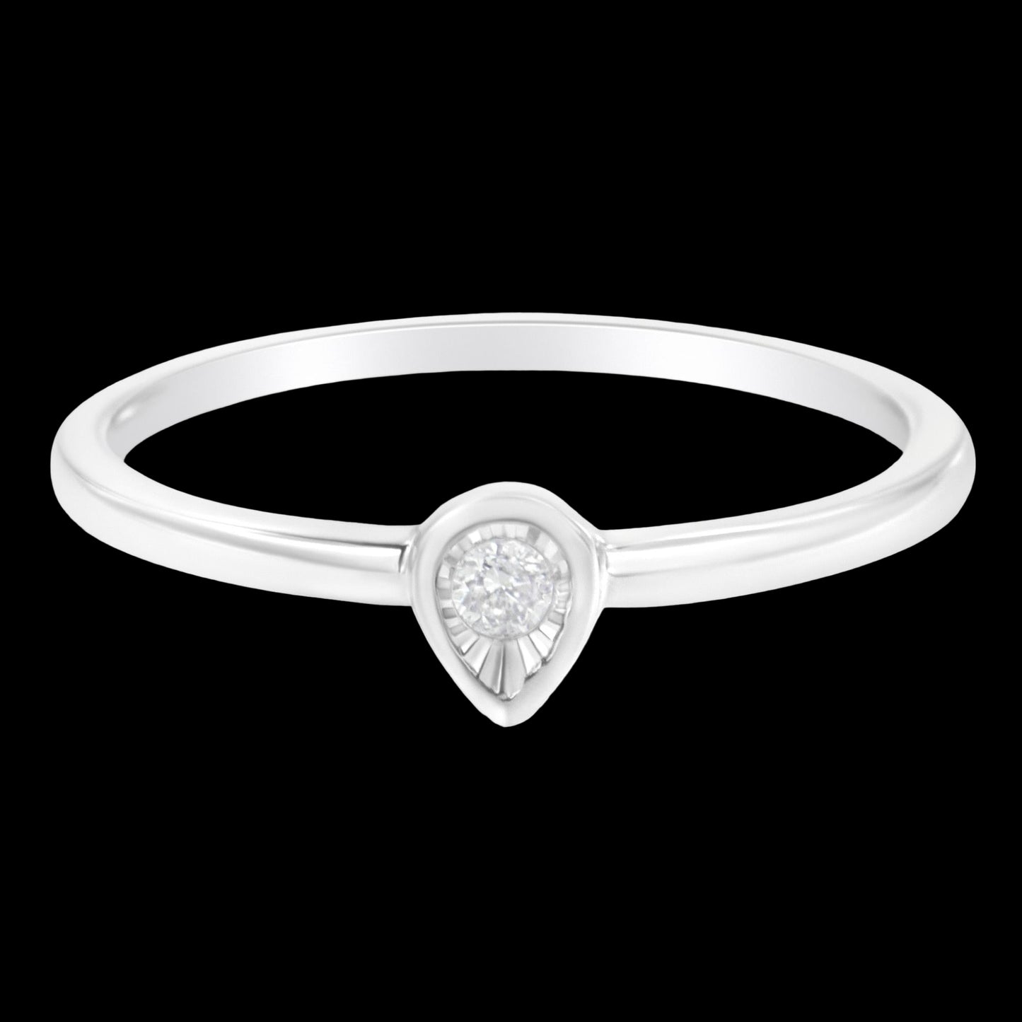 Silver ring with a teardrop-shaped diamond on a white background