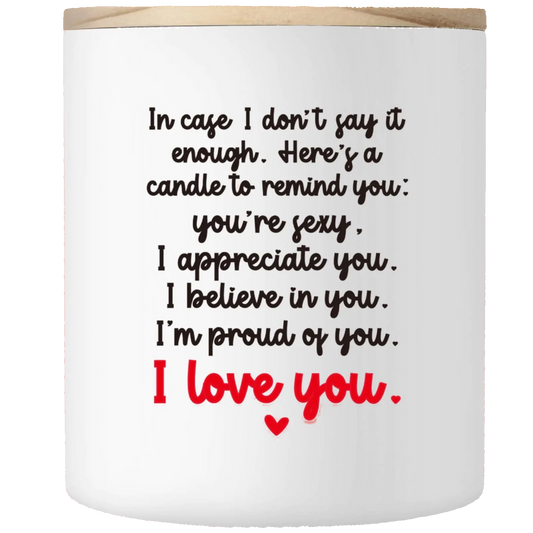 Candle with sentimental message on a white background