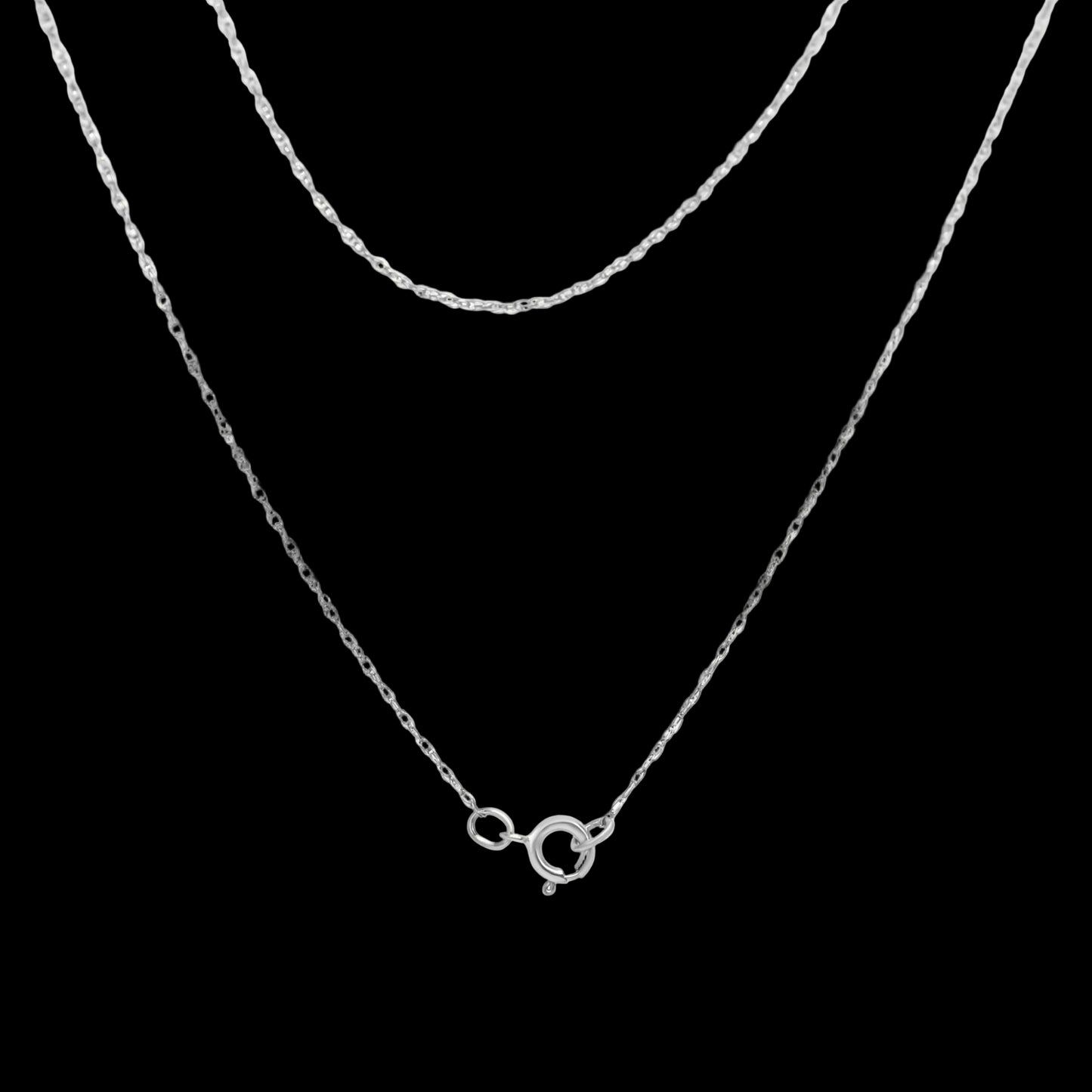 Silver necklace with a small round pendant on a white background