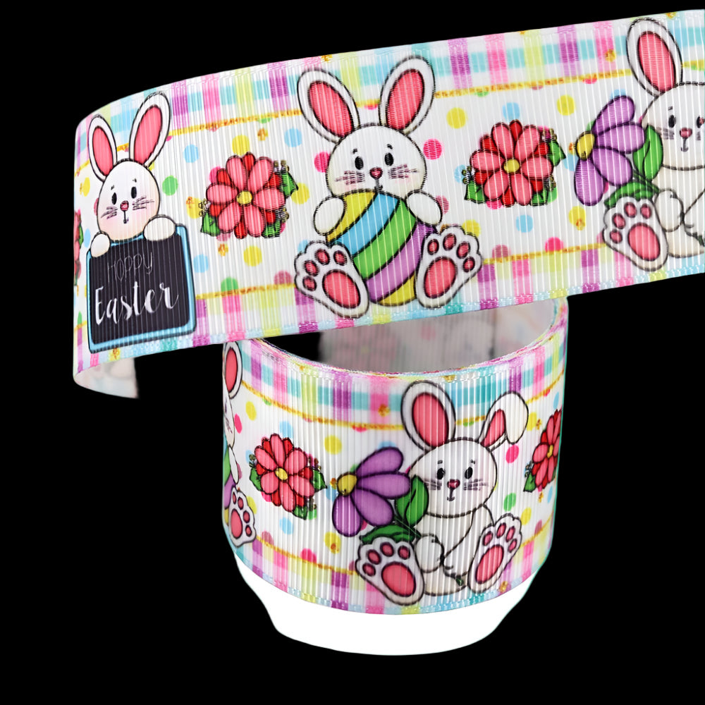 Grosgrain ribbon with Easter-themed design featuring bunnies and flowers on a white background.