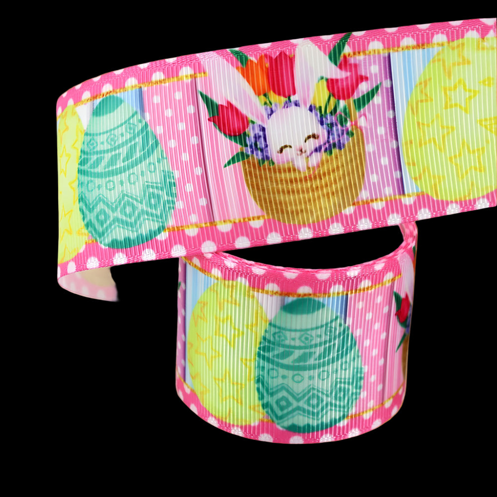 Colorful ribbon with Easter design featuring eggs and a bunny on a white background