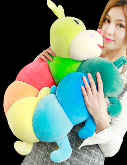 Woman holding a colorful plush toy in a coffee shop setting