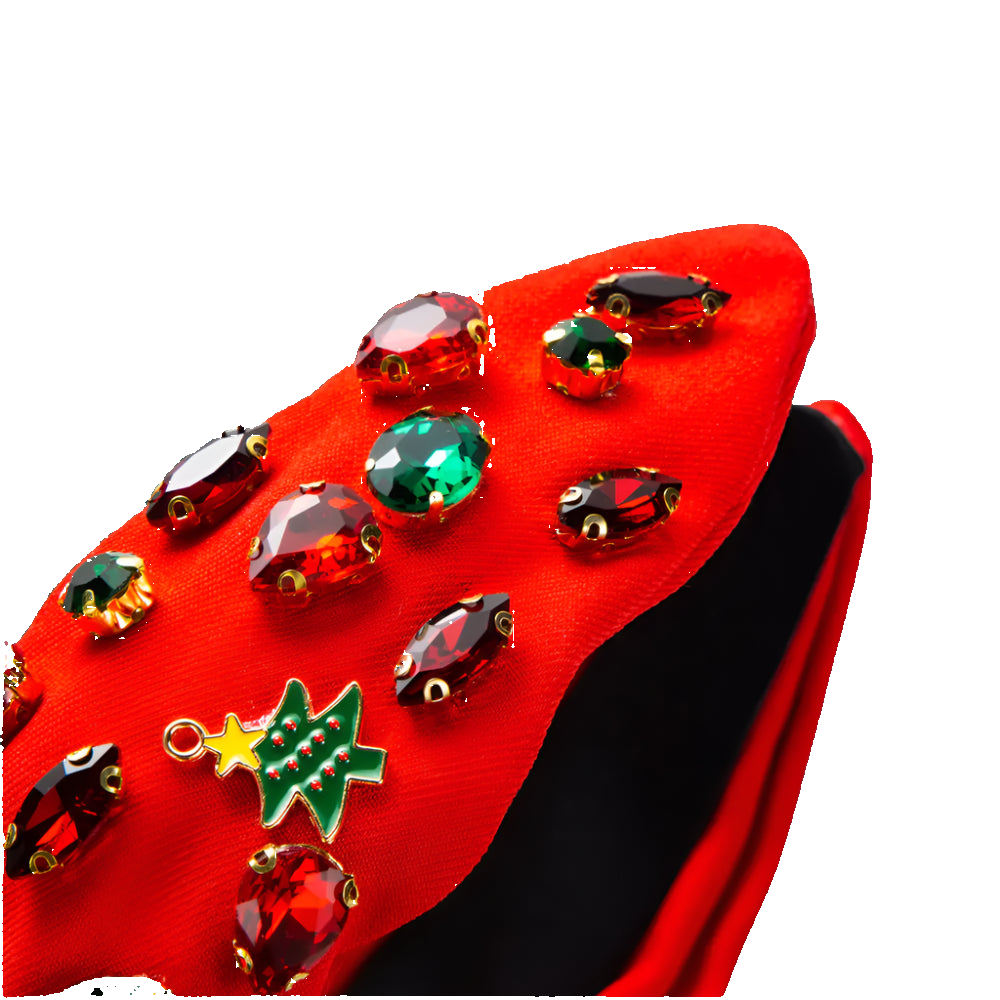Red shoe with colorful gemstones on a white background