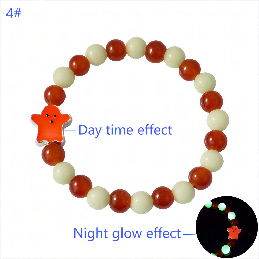 Beaded bracelet with a star-shaped charm showing day and night glow effects.