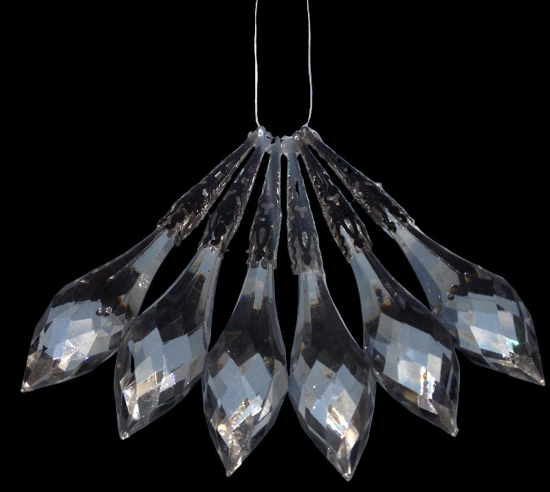 Crystal chandelier against a cloudy sky