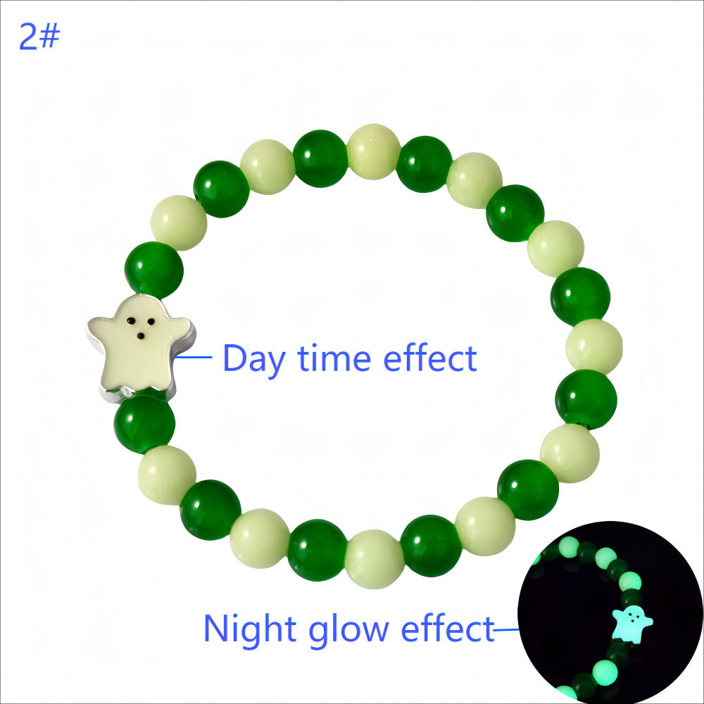 Green and white beaded bracelet with a star-shaped charm, showing day and night glow effects.