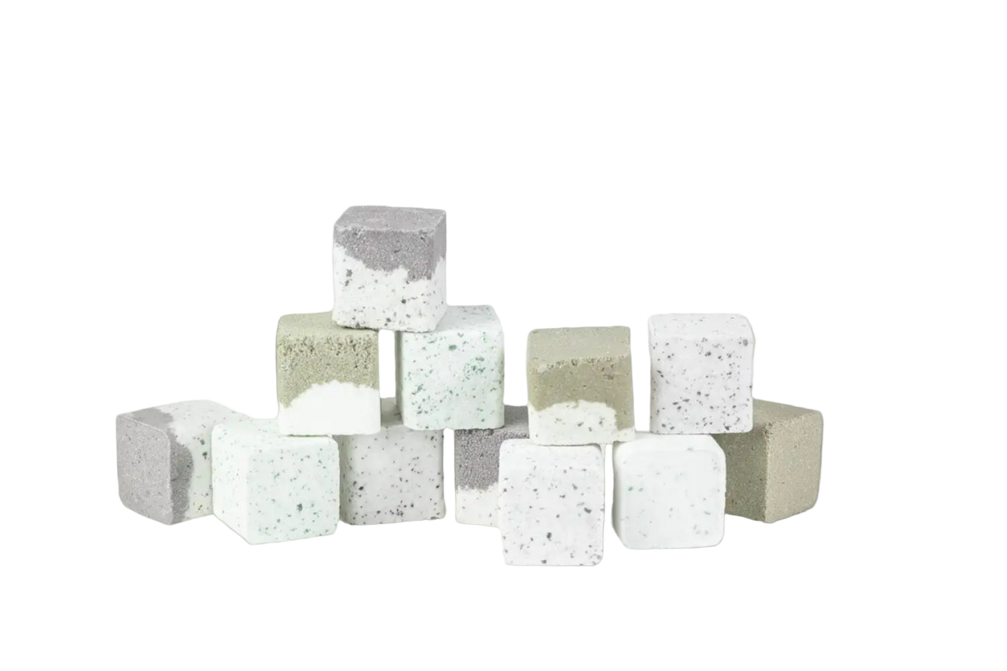 Stack of concrete blocks with speckled pattern on a white background