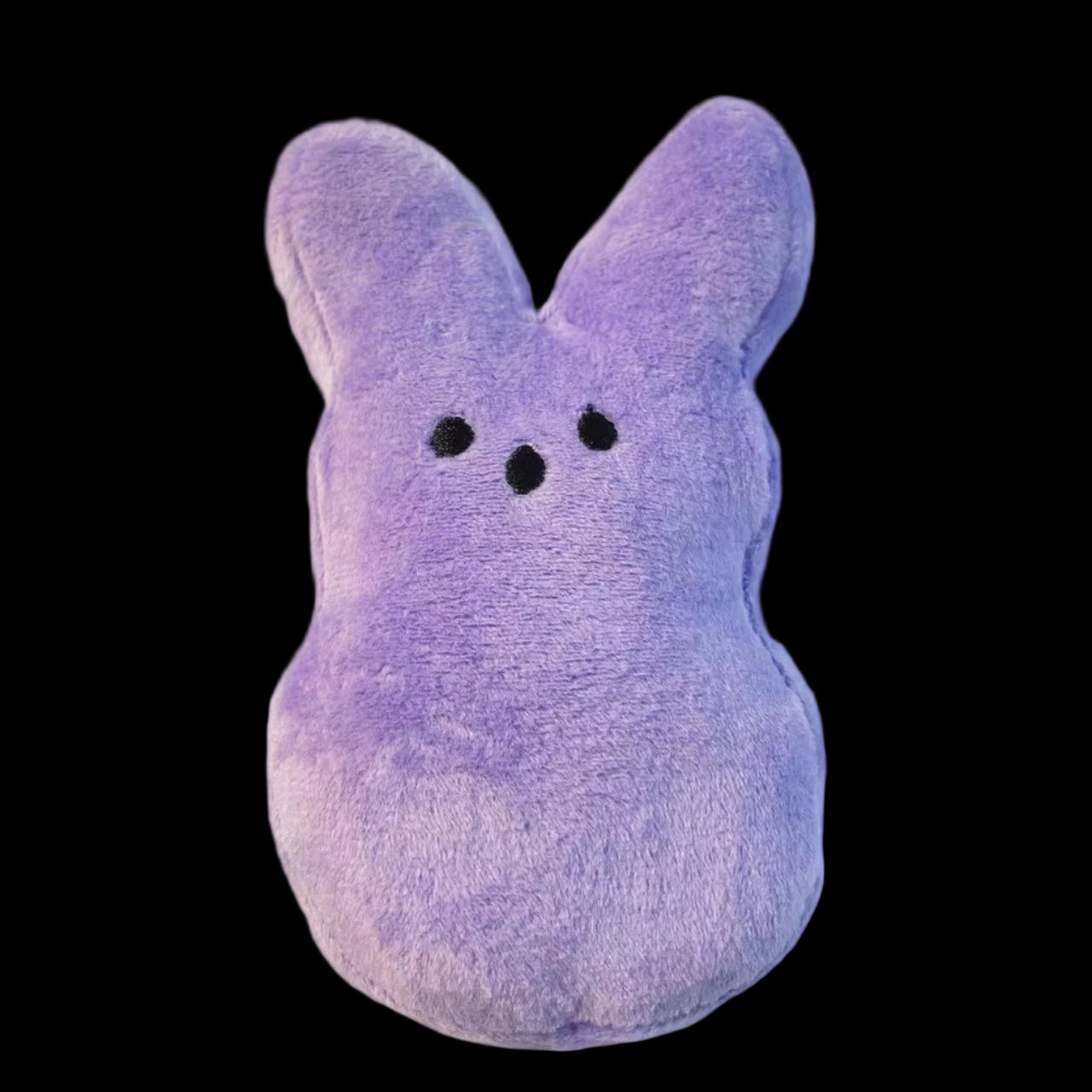 Purple plush toy with a neutral background