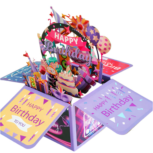Pop-up birthday card with colorful design and 'Happy Birthday' text, surrounded by green plants.