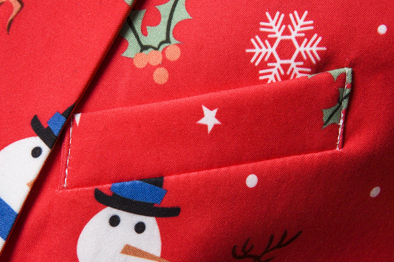 Close-up of red fabric with Christmas-themed patterns including snowflakes, stars, and snowmen.