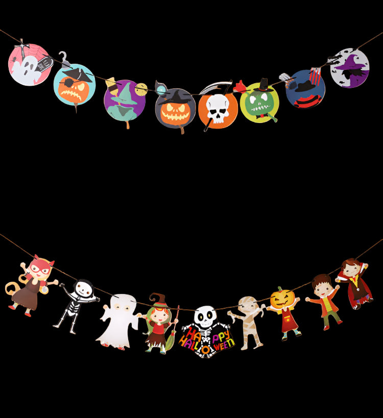 Halloween-themed paper garlands with colorful designs on a gray background