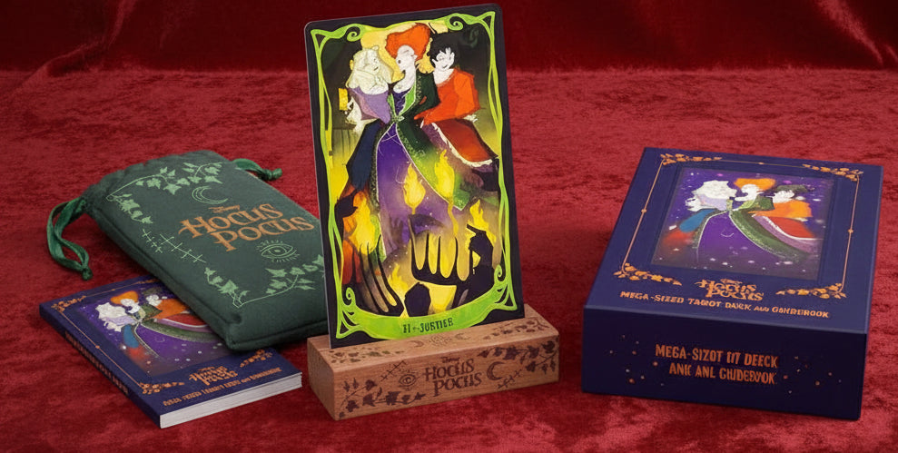 Hocus Pocus themed tarot cards with a green drawstring bag and purple box on a white background