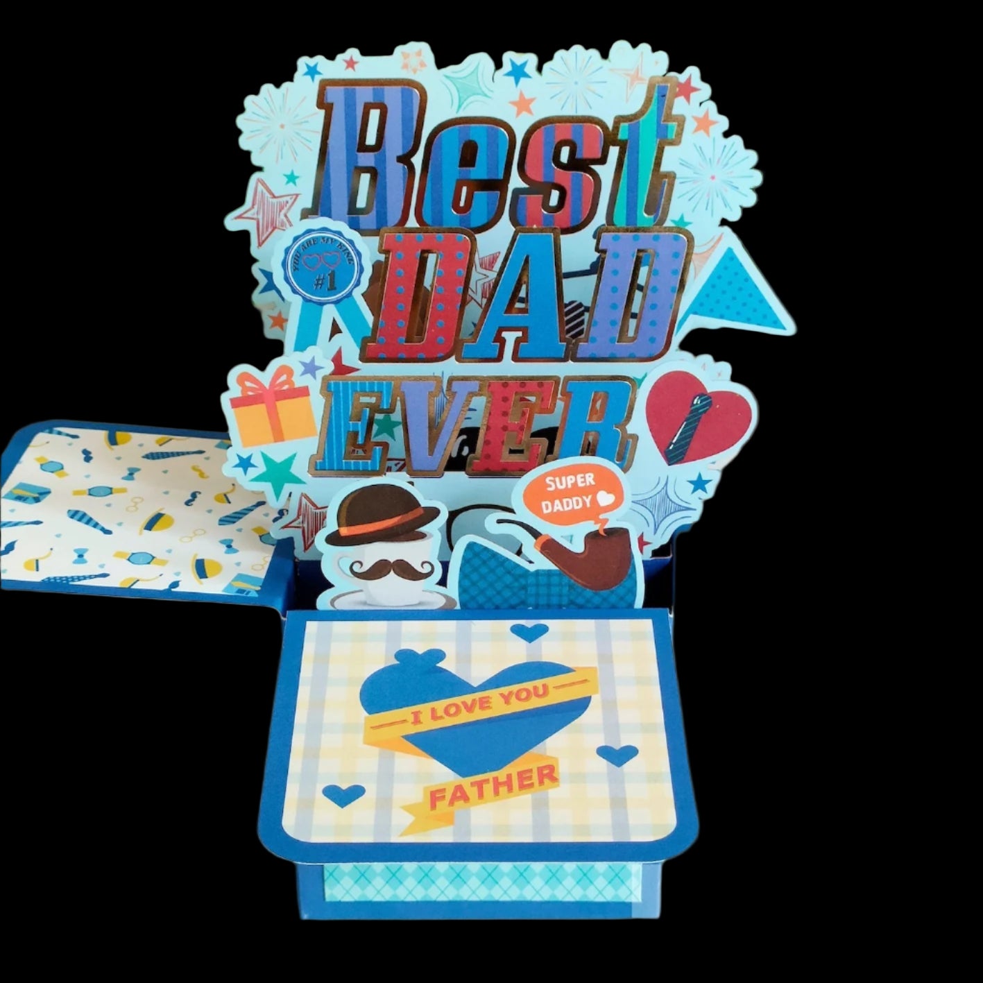 Pop-up card with 'Best Dad Ever' text and decorative elements on a white surface with plants in the background.