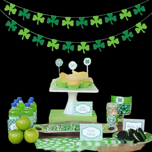 St. Patrick's Day-themed party setup with green decorations and treats on a table.