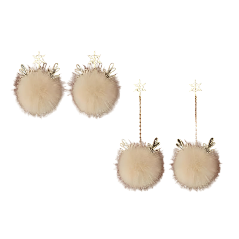 Pair of beige pom-pom earrings with gold snowflake details on a brown background.