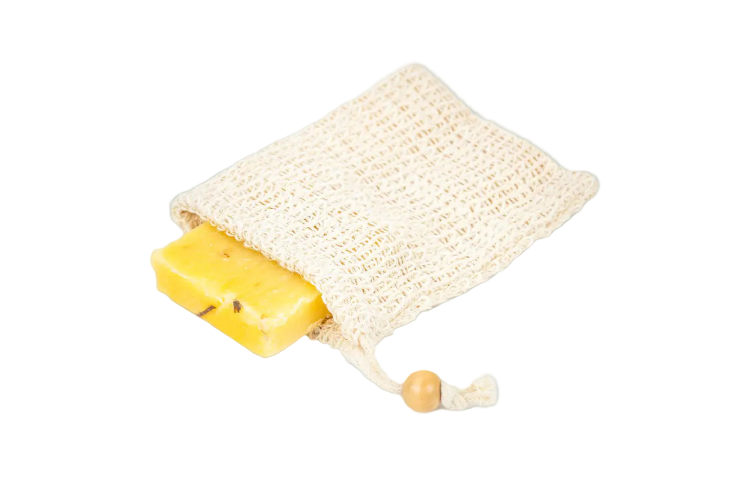 Yellow bar of soap in a beige woven pouch on a white background