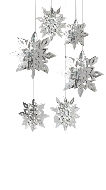 Silver snowflake decorations hanging against a white background
