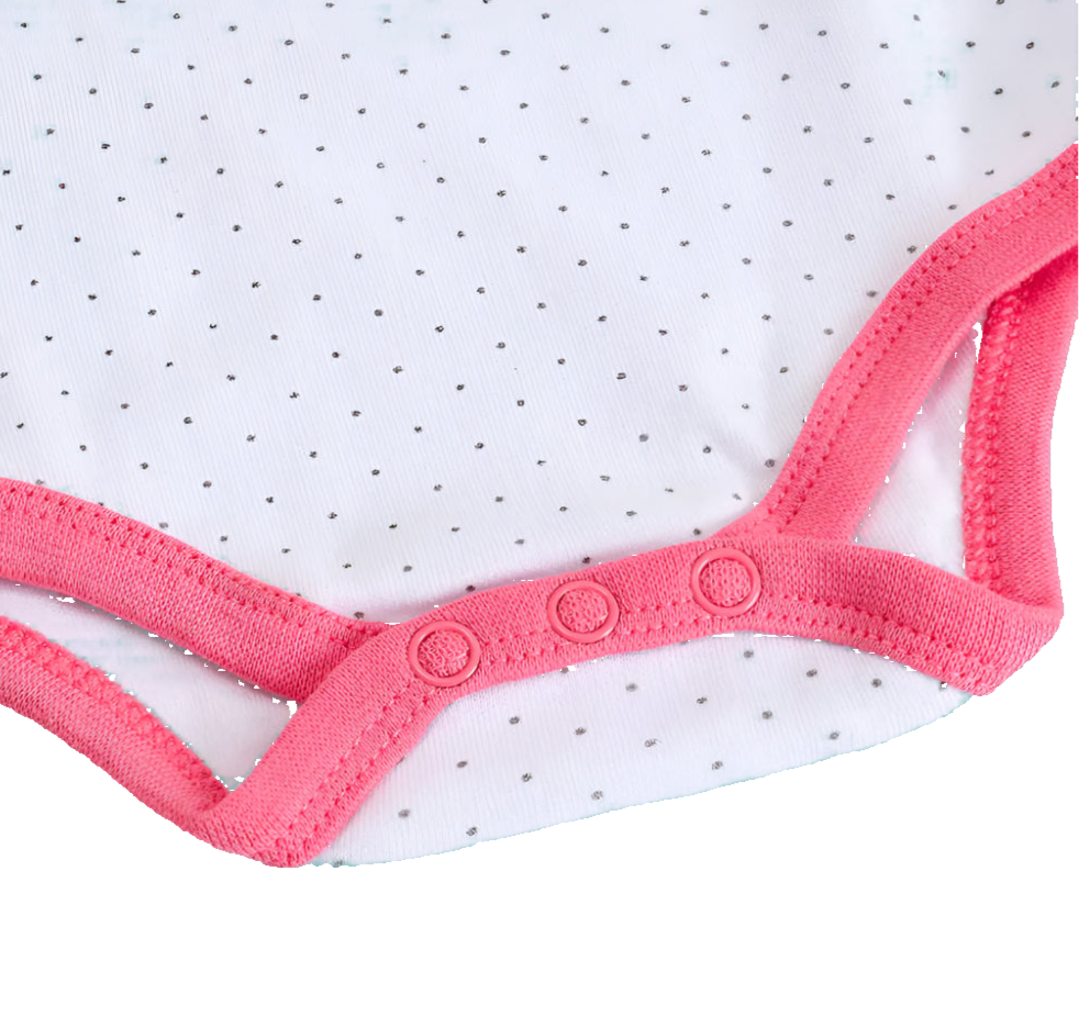 Close-up of pink thong on a white background with black dots