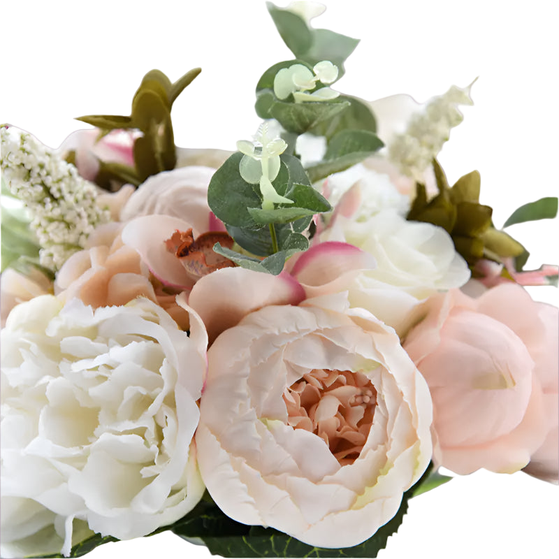Bouquet of pink and white flowers with green leaves on a white background