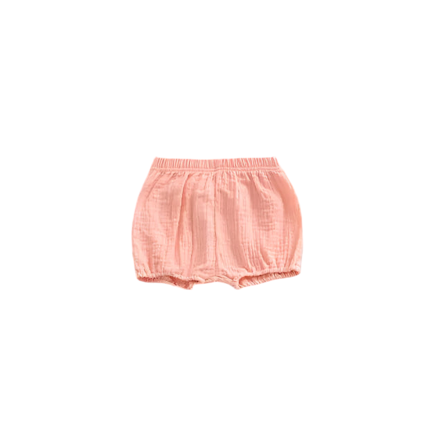 Pink baby bloomers on a light gray background