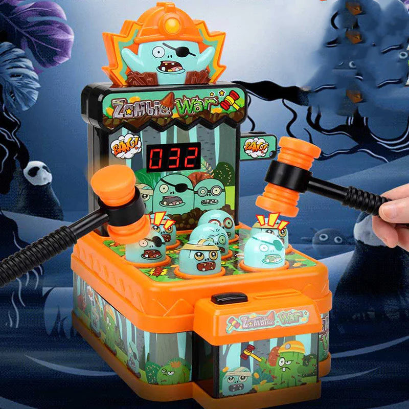 Toy arcade machine with cartoon characters and a hand using a mallet to hit them, set against a dark background.