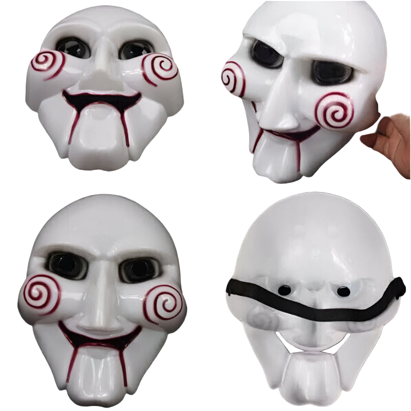 White mask with red spiral designs on a black background
