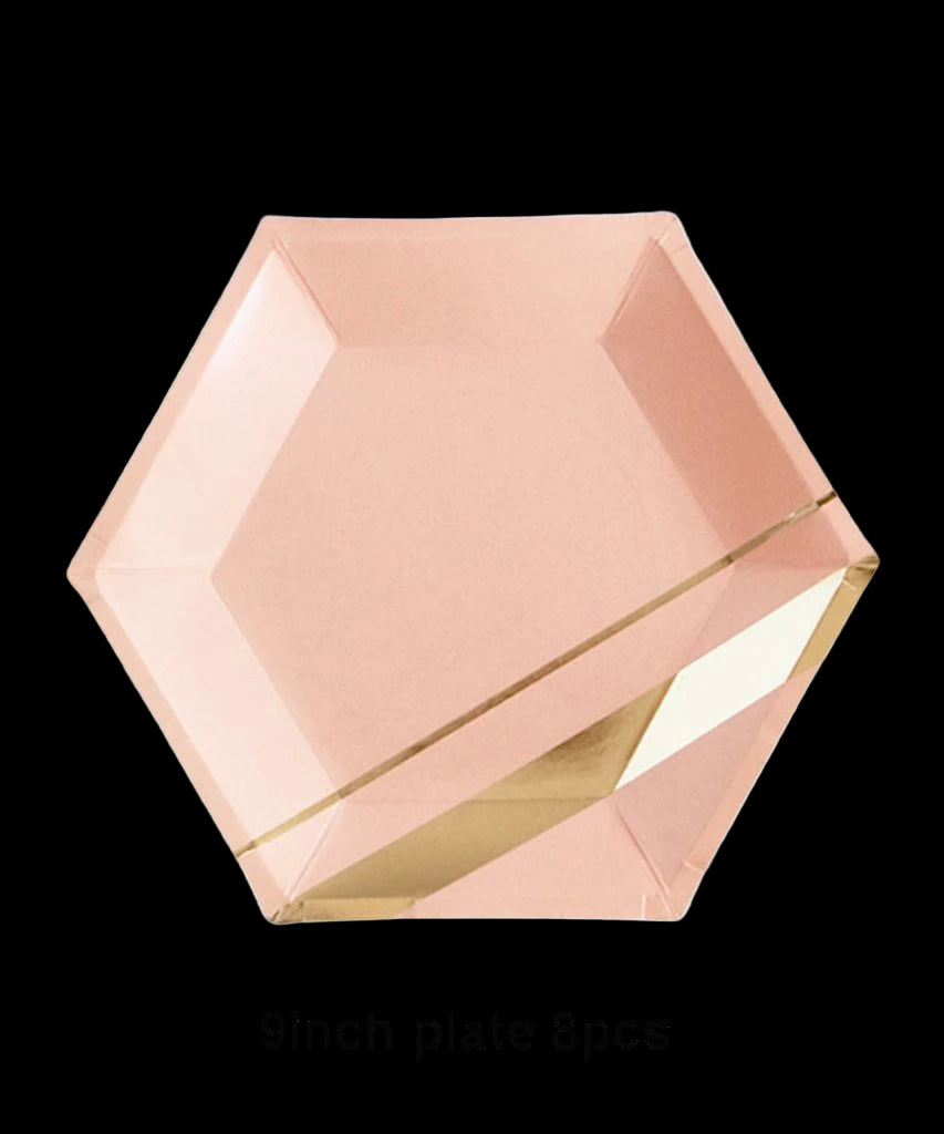 Rose gold geometric plate on a white background