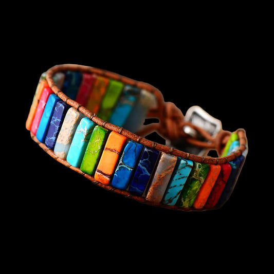 Multicolored stone bracelet on a wooden surface