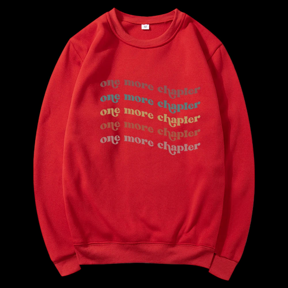 Red sweatshirt with 'one more chapter' text on a white background