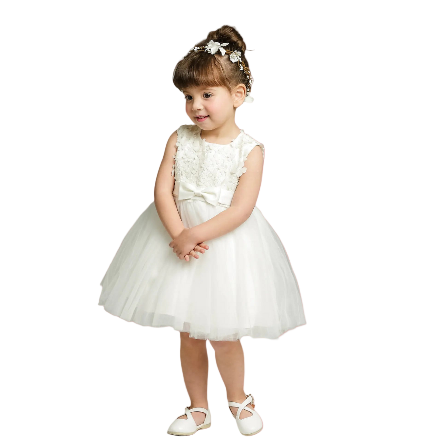 Young girl wearing a white dress with floral details on a gray background